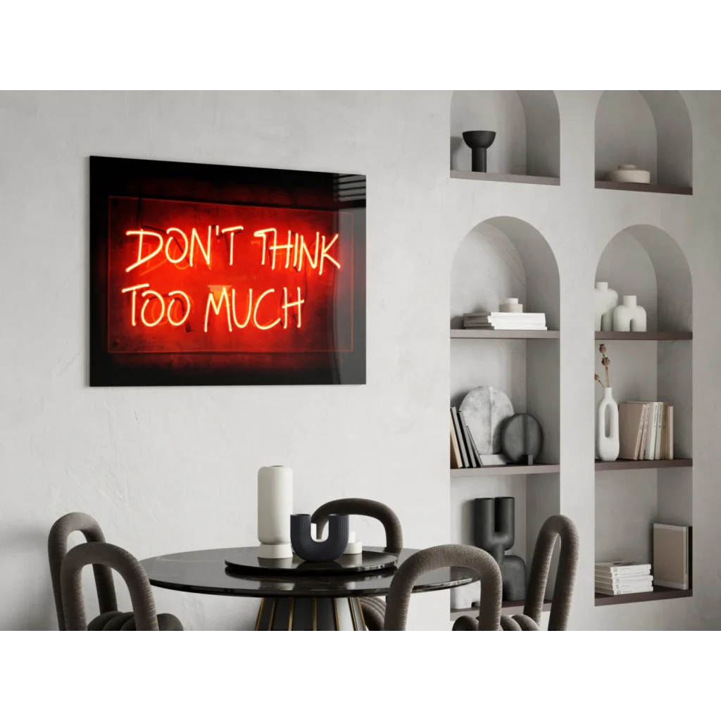 Glowing red neon glass wall art sign saying dont think too much