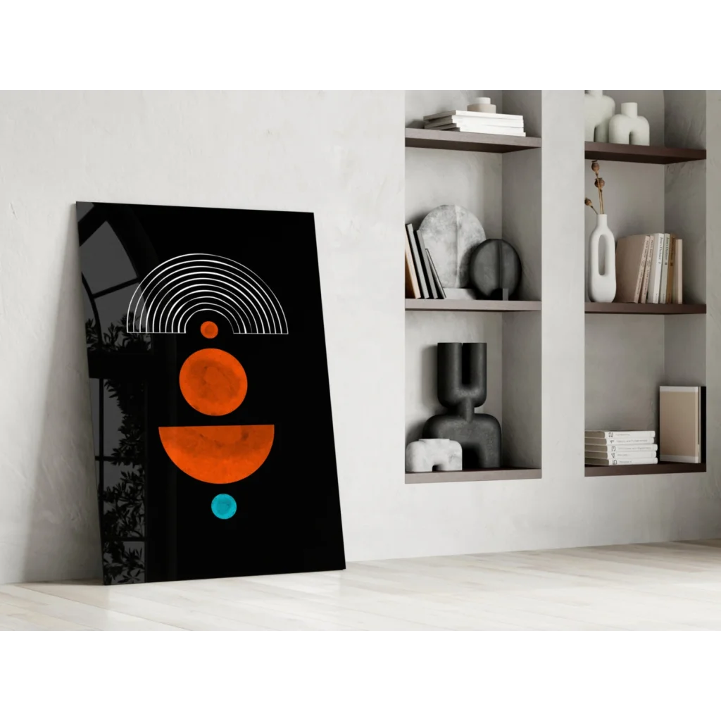 Bold orange teal geometric glass wall art on glossy black panel
