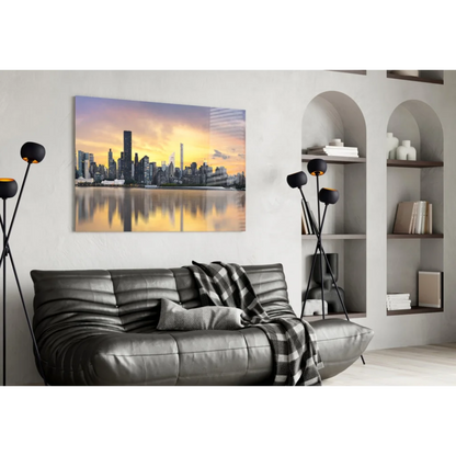 Golden sunset skyline glass wall art with reflective waters