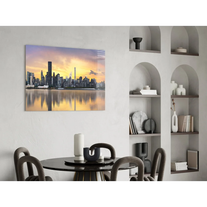 Golden sunset skyline glass wall art with reflective waters