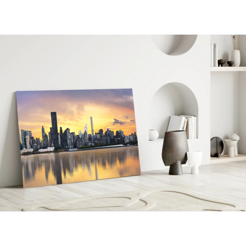 Golden sunset skyline glass wall art with reflective waters