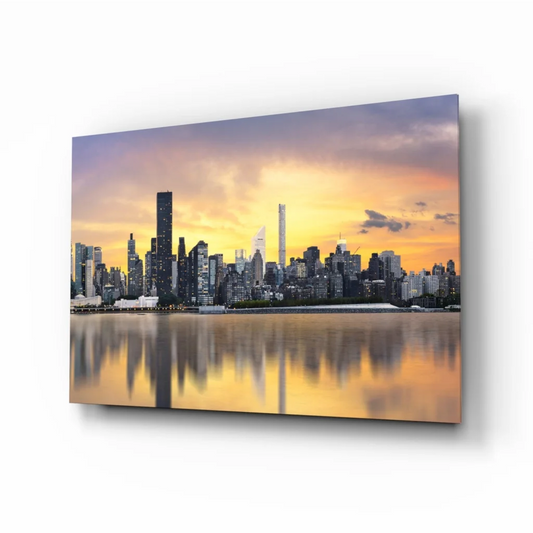 Golden Sunset Skyline glass wall art with reflective waters