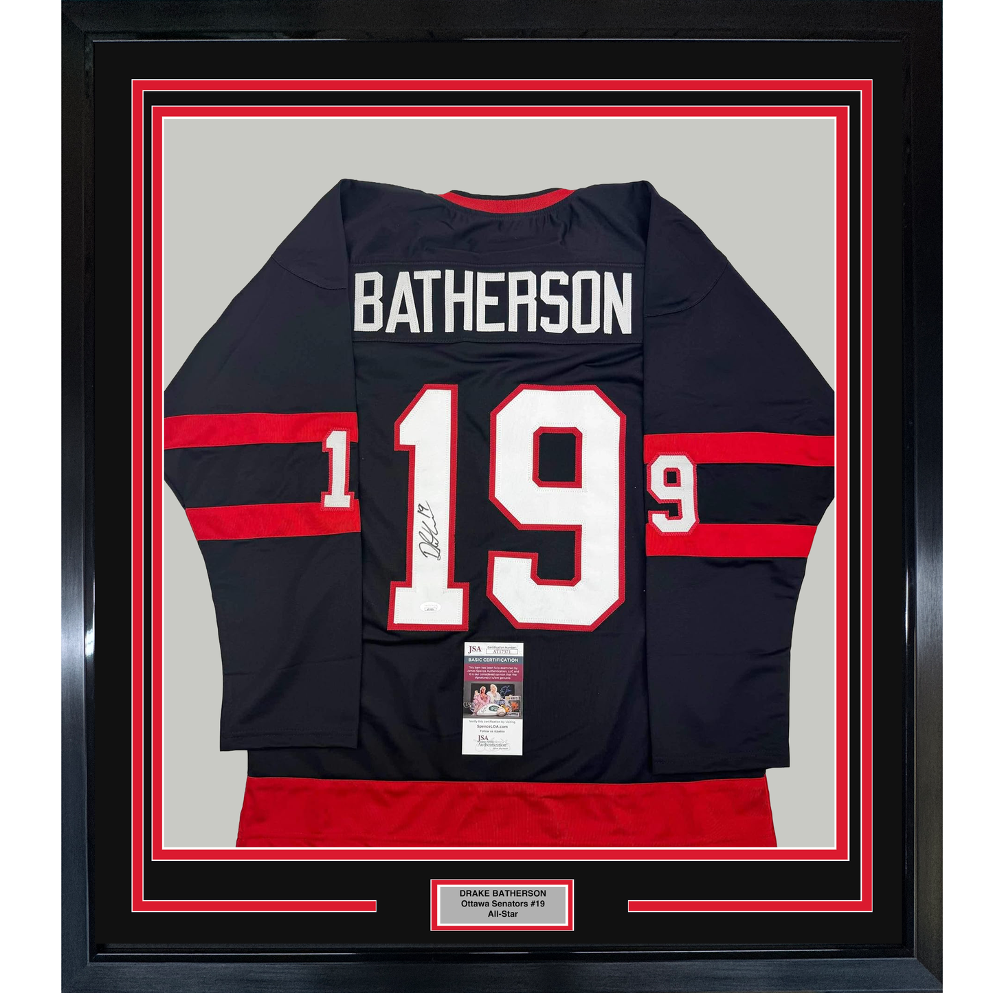Framed front view of black and red striped Ottawa Senators hockey jersey #19 Batherson with white lettering and JSA authentication certificate.