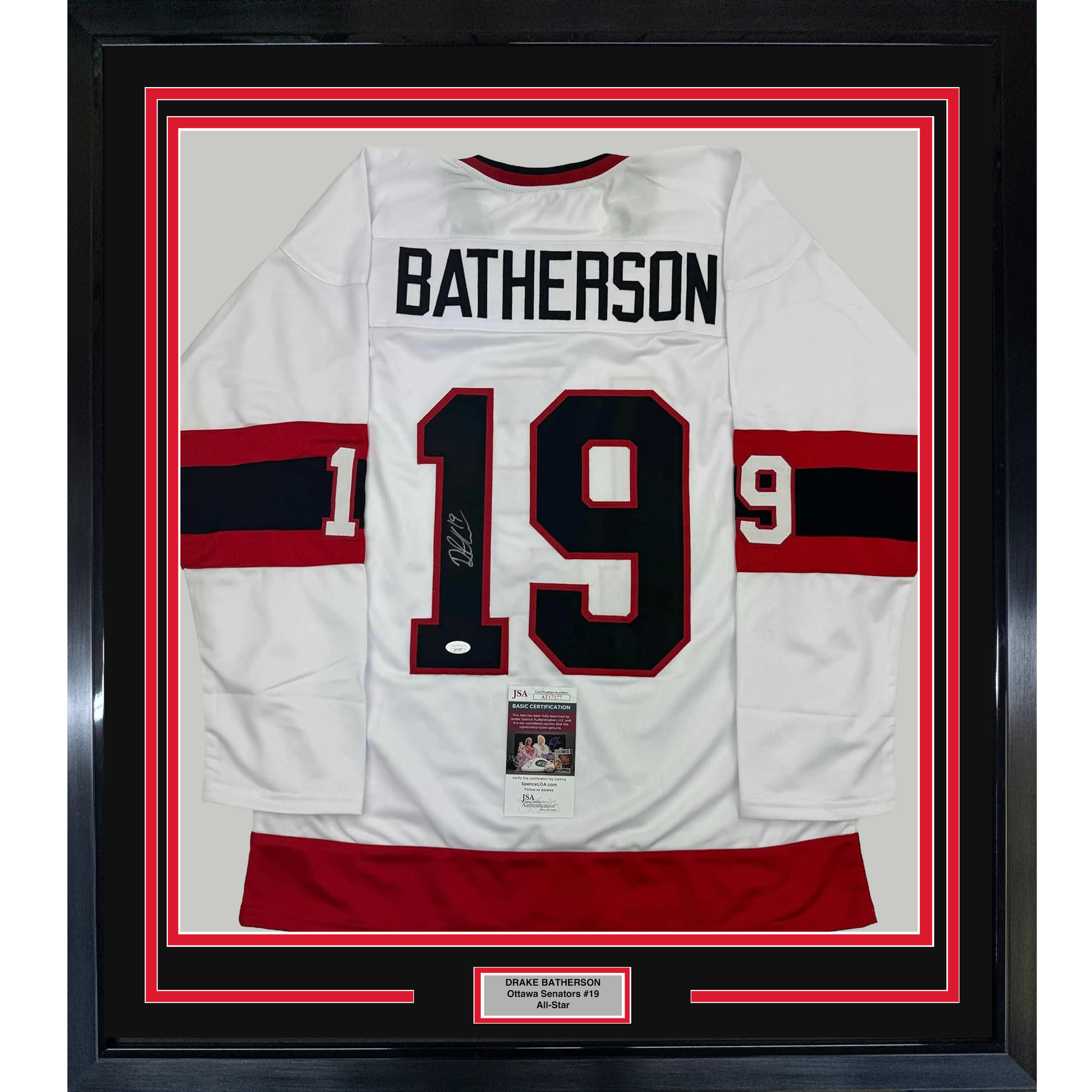 Framed white Ottawa Senators hockey jersey #19 with "BATHERSON" nameplate, signed, displayed front-facing with red and black striped trim and JSA authentication certificate visible.