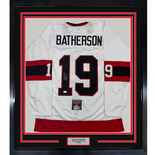 Framed white Ottawa Senators hockey jersey #19 with "BATHERSON" nameplate, signed, displayed front-facing with red and black striped trim and JSA authentication certificate visible.