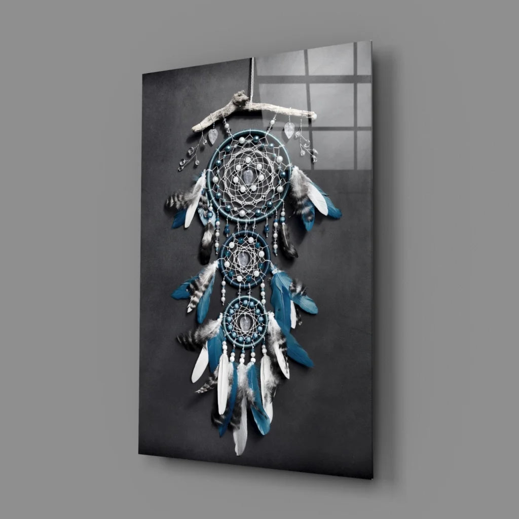 Stunning teal dreamcatcher wall art with feathers, beads, and wood branch