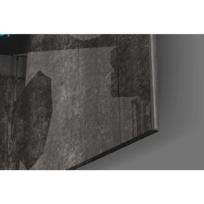 Dream Maker glass wall art on dark gray stone slab with textured seams