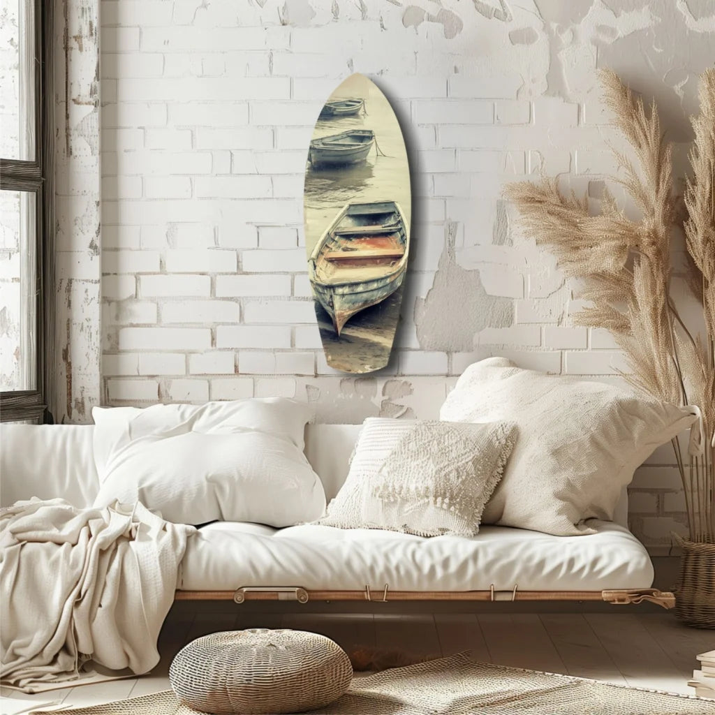 Vintage surfboard tempered glass art with weathered boats scene on white brick wall