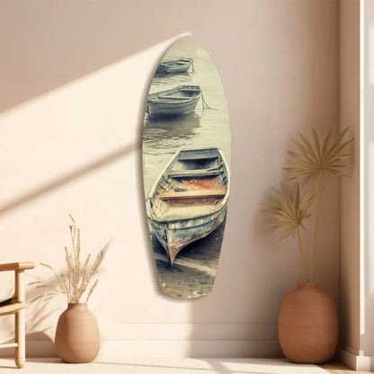 Sleek surfboard-framed tempered glass art with serene weathered boats scene