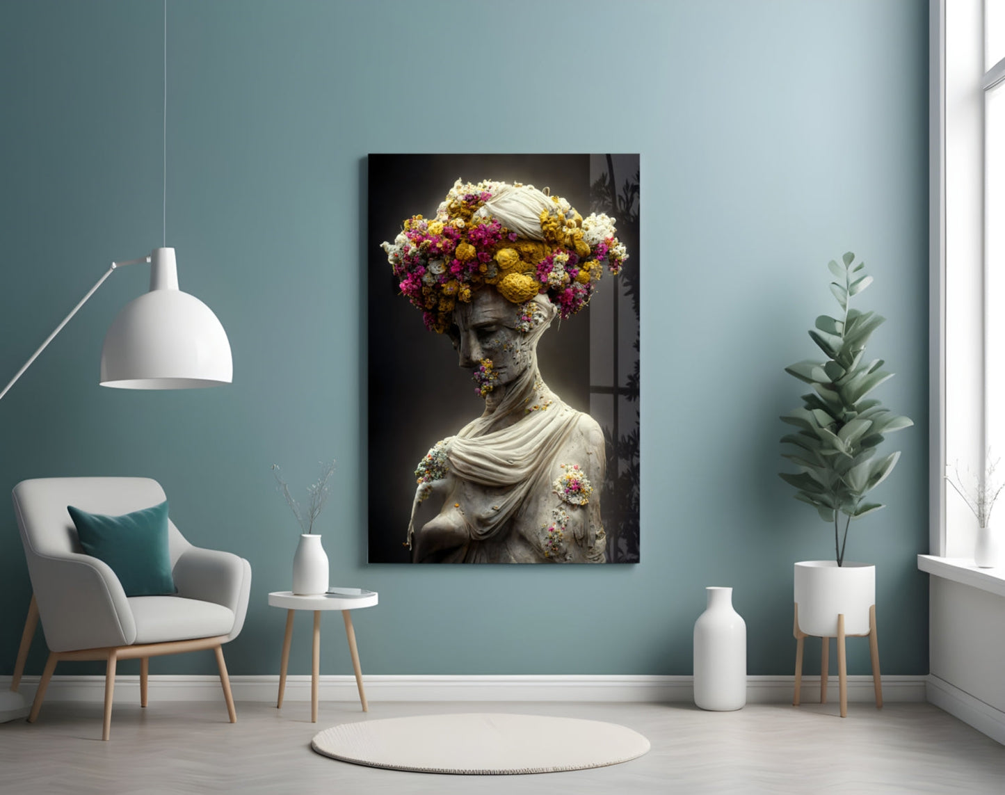 Classical stone statue with colorful floral crown and shoulder details displayed on teal wall in modern interior setting.