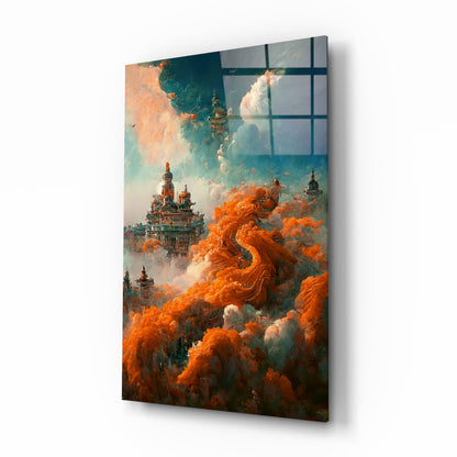 Angled view of glass art panel displaying ornate castles emerging from swirling orange and white clouds against blue sky.