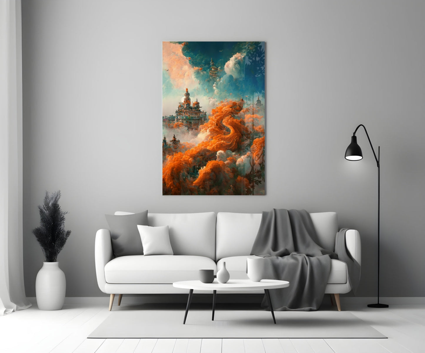 Dream Castle Glass Art mounted above white sofa in minimalist living room setting with orange clouds and architectural elements visible.