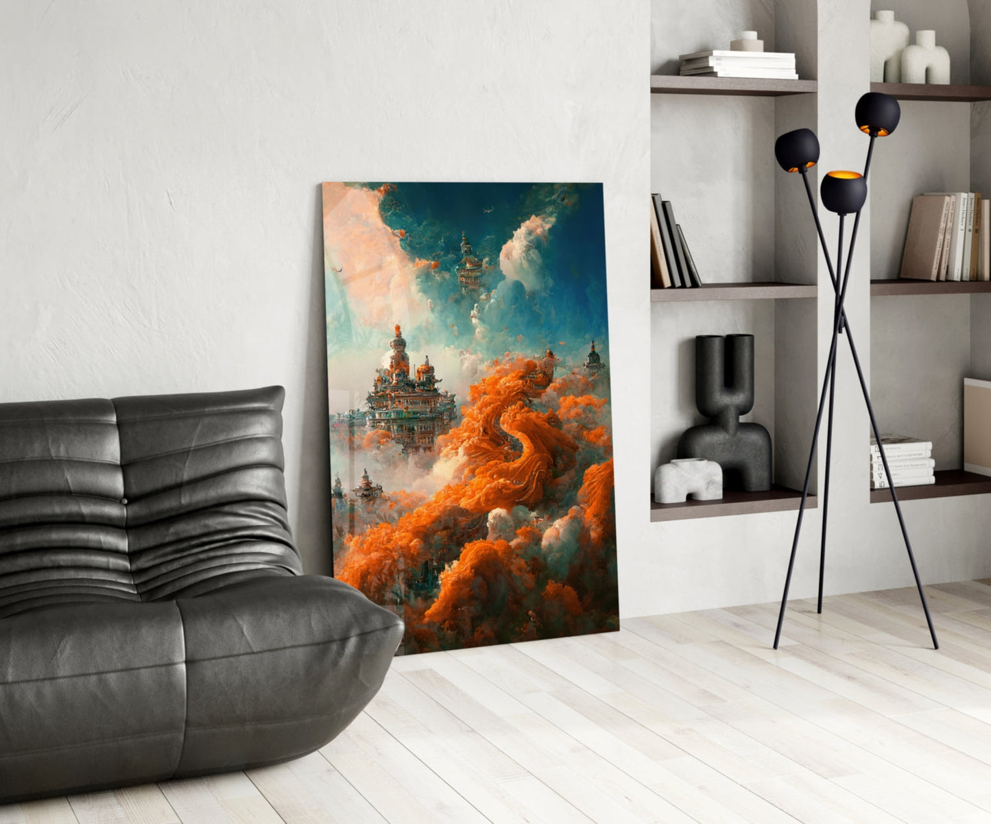 Dream Castle Glass Art leaning against white wall in modern living room with black sofa and shelving unit.
