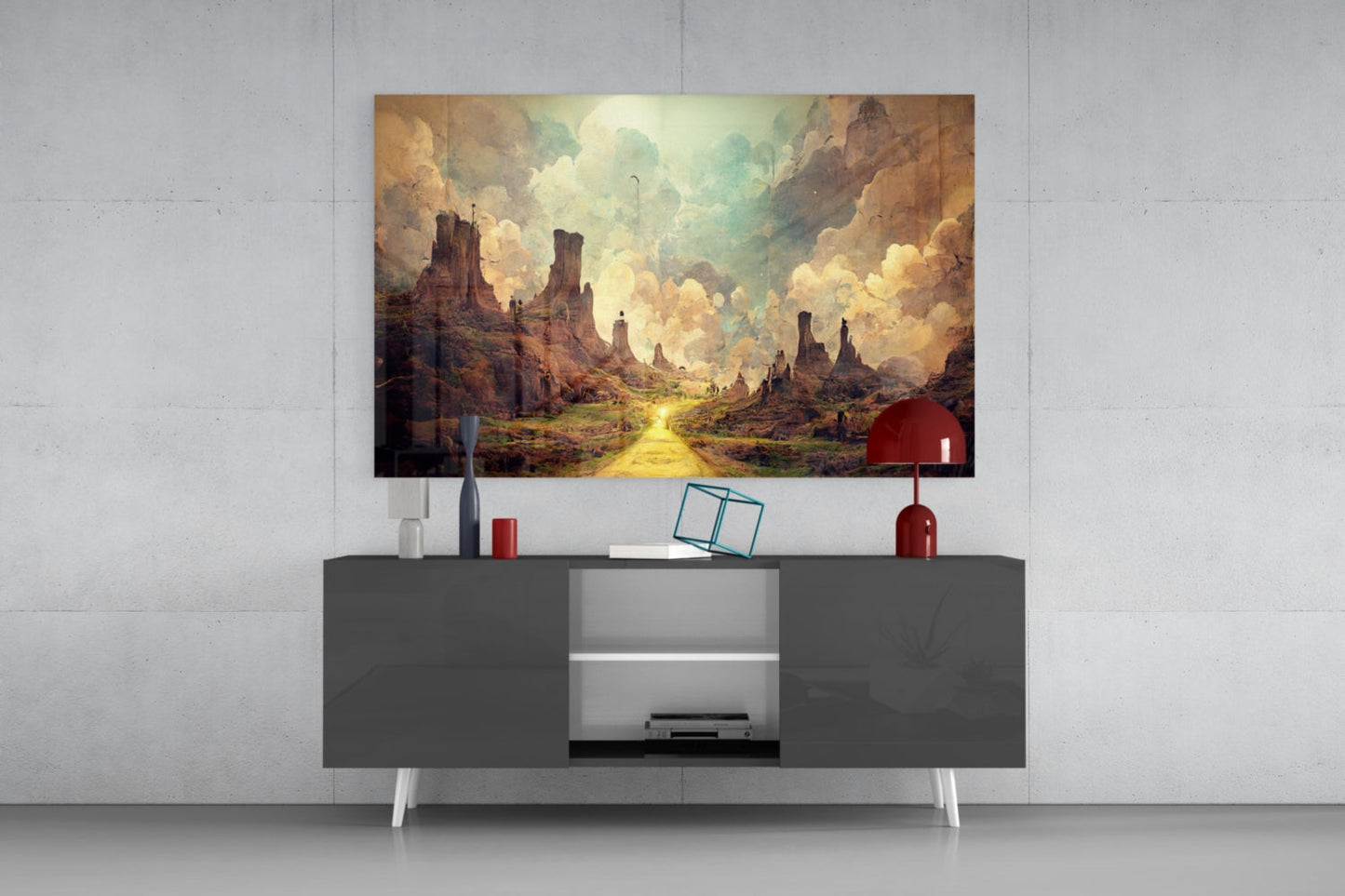 Fantasy landscape glass art print mounted above dark gray media console with white legs, displaying golden path through rock formations under cloudy sky.