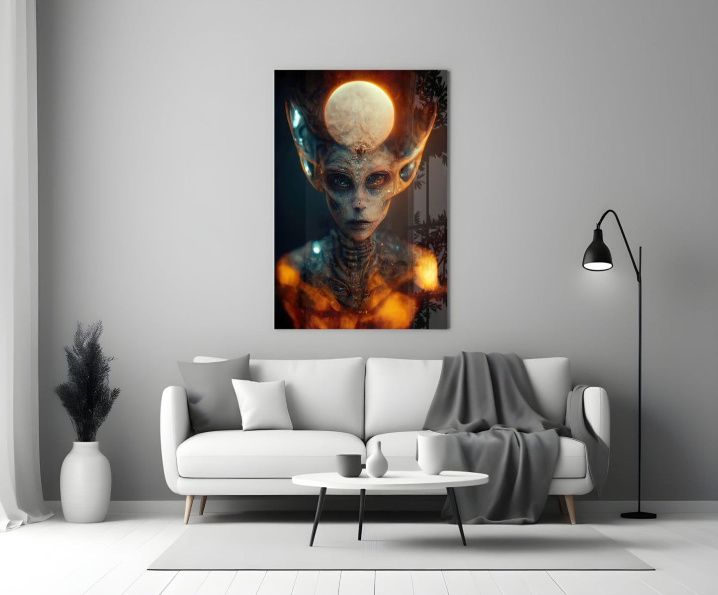 A mystical alien figure with glowing moon orb held above its head, surrounded by golden fire and ethereal blue light, displayed as framed glass art on a living room wall.