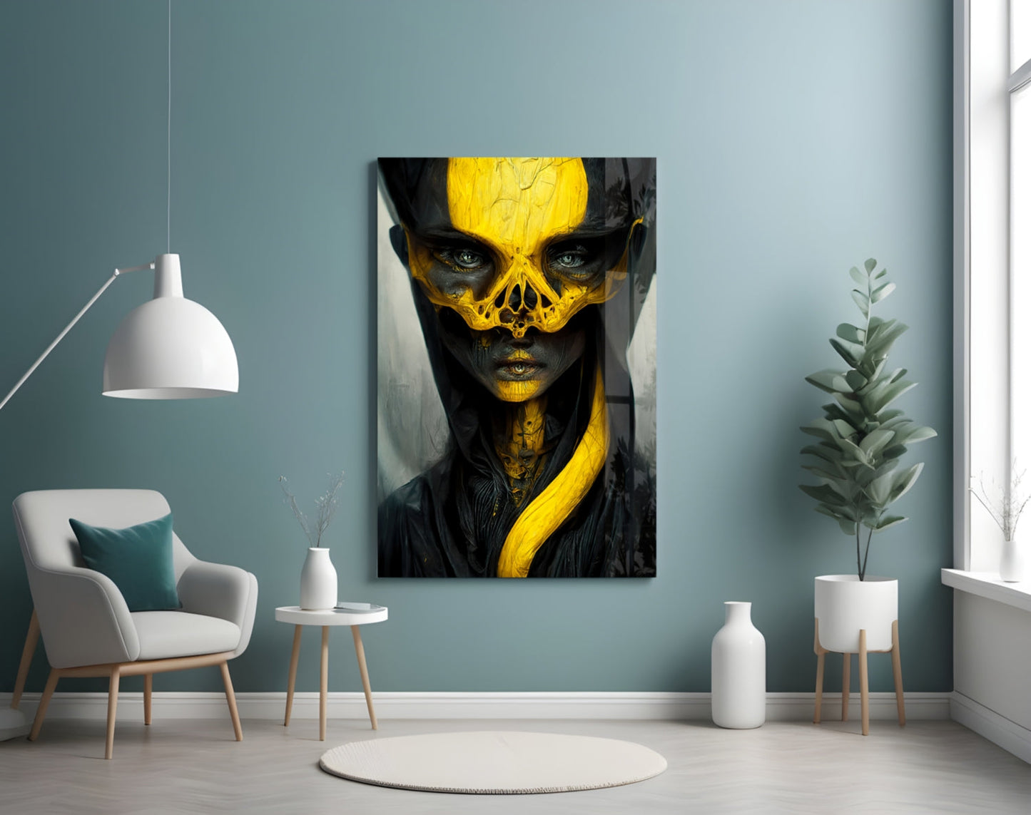 Vertical glass art panel displaying stylized portrait with black and yellow skull-face design on teal wall in modern interior setting.