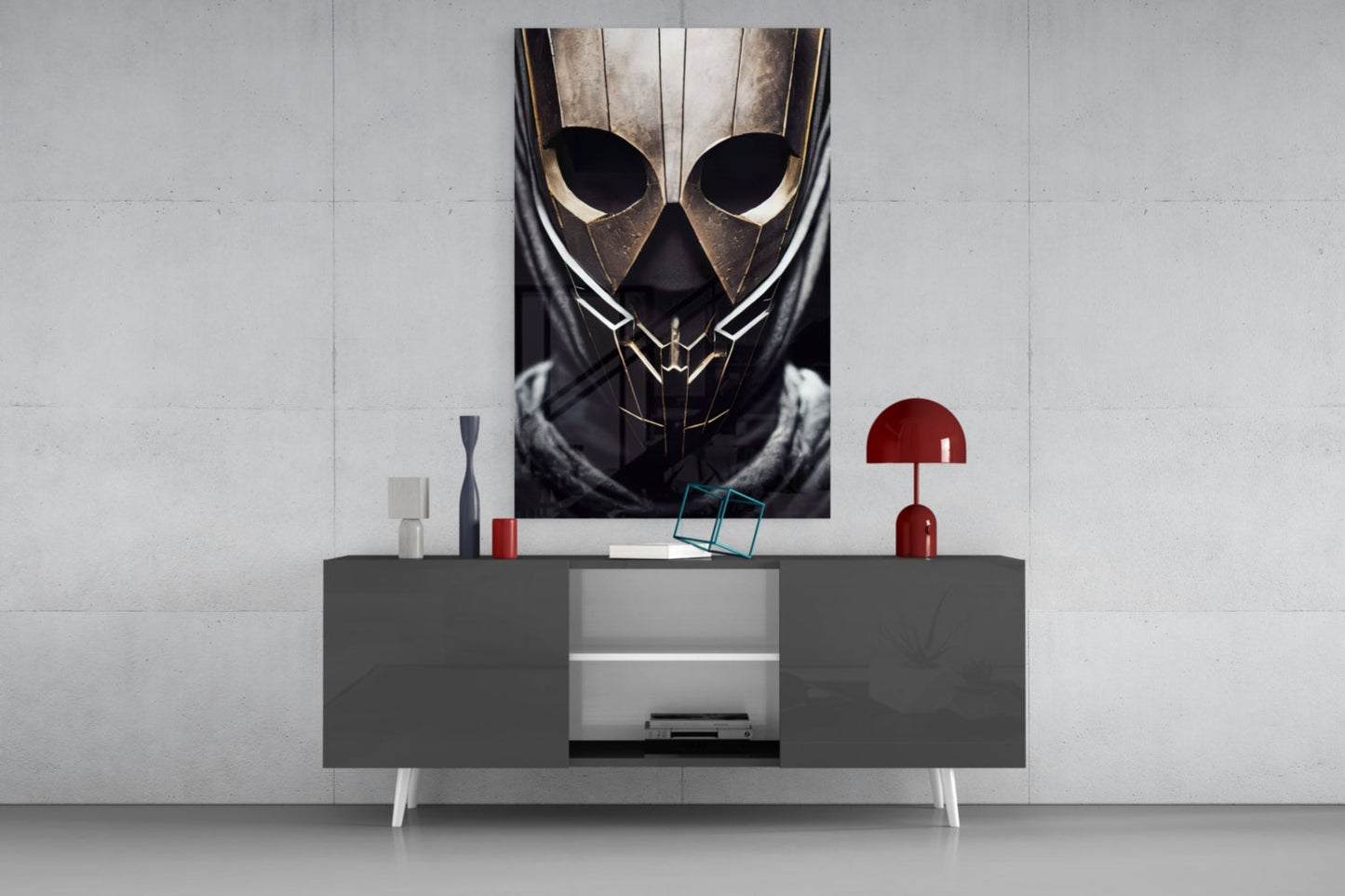 Framed Peace Fighter Glass Art depicting metallic armored mask with gold accents displayed above gray media console with red lamp and decorative objects.