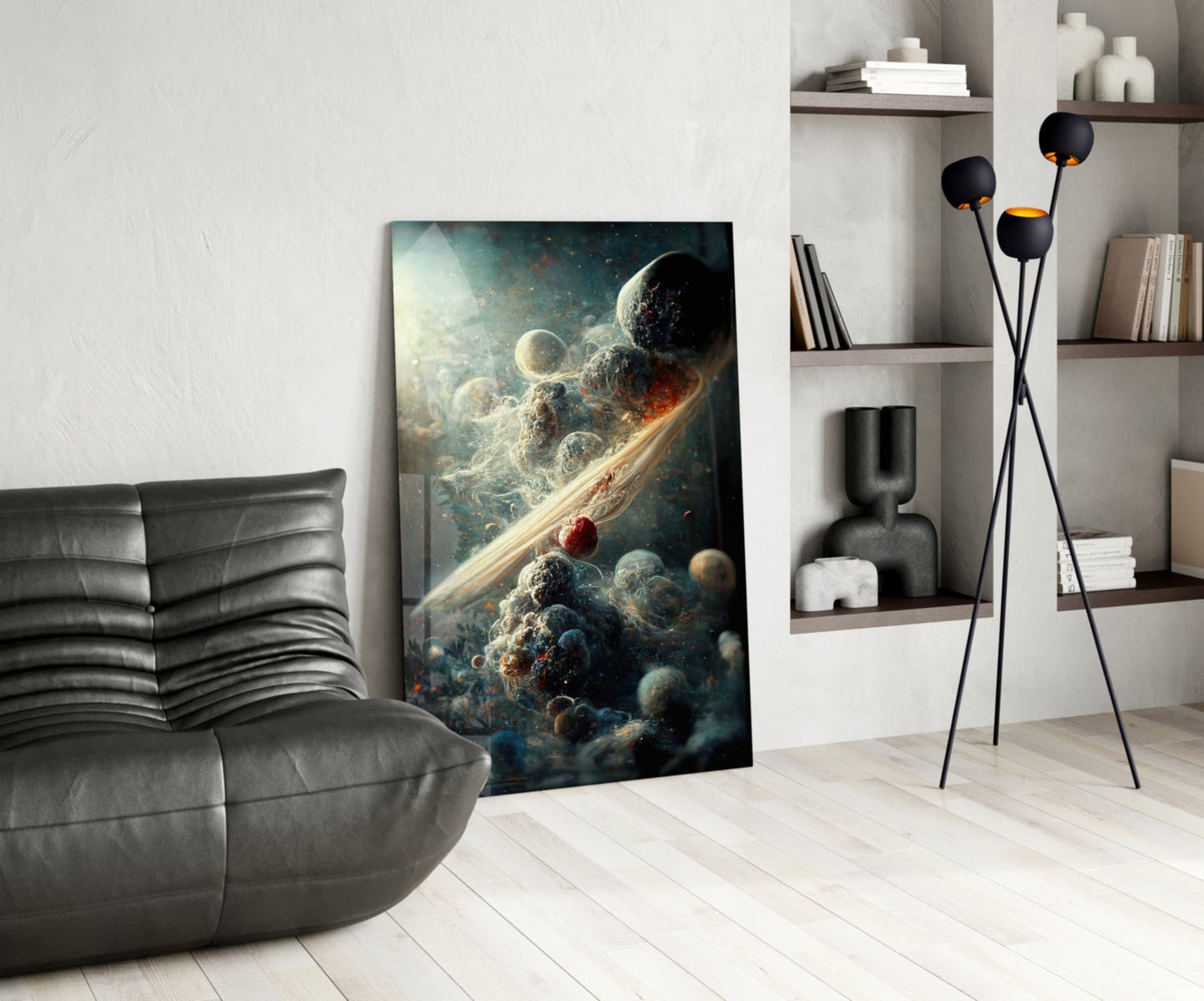 Abstract cosmic artwork featuring planets and golden light rays displayed in modern living room with gray sofa and wooden shelving.