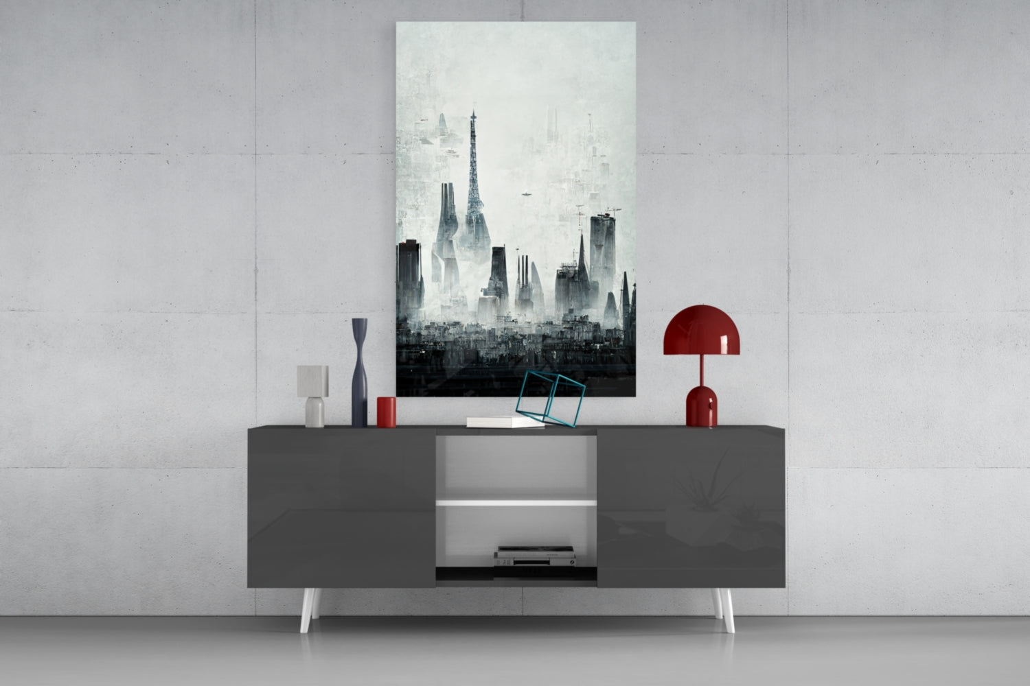 Monochromatic cityscape glass art print displayed above gray console table with white legs, styled with red lamp and decorative objects.