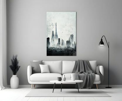 Monochromatic cityscape canvas art depicting layered skyscraper silhouettes hanging above a white sofa in a modern living room.