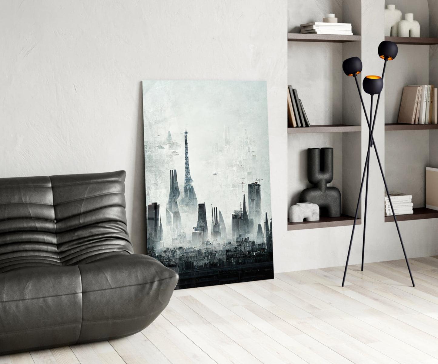 Moody cityscape canvas leaning against white wall beside black leather chair and floor lamp in modern interior.