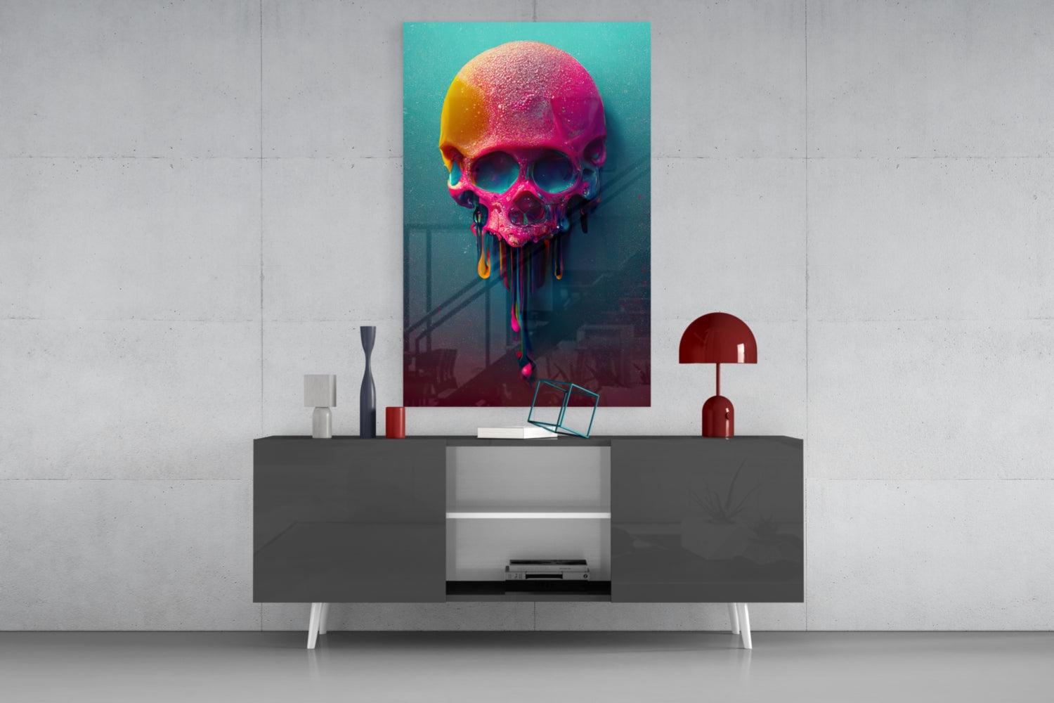 Colorful neon skull artwork with dripping paint effect displayed above a modern gray console table with red decorative accessories.