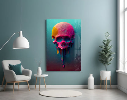 Colorful melting skull artwork displayed on turquoise wall above white chair and potted plant in modern interior setting.