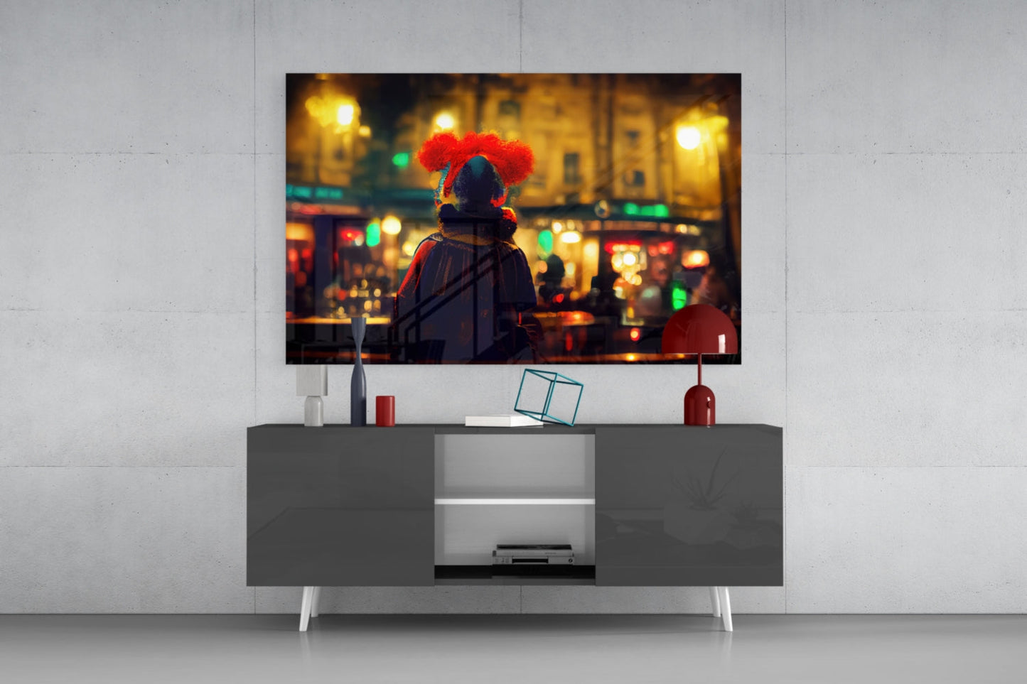 Teal glass cube sculpture displayed on dark TV console with red clown figure artwork on screen above.