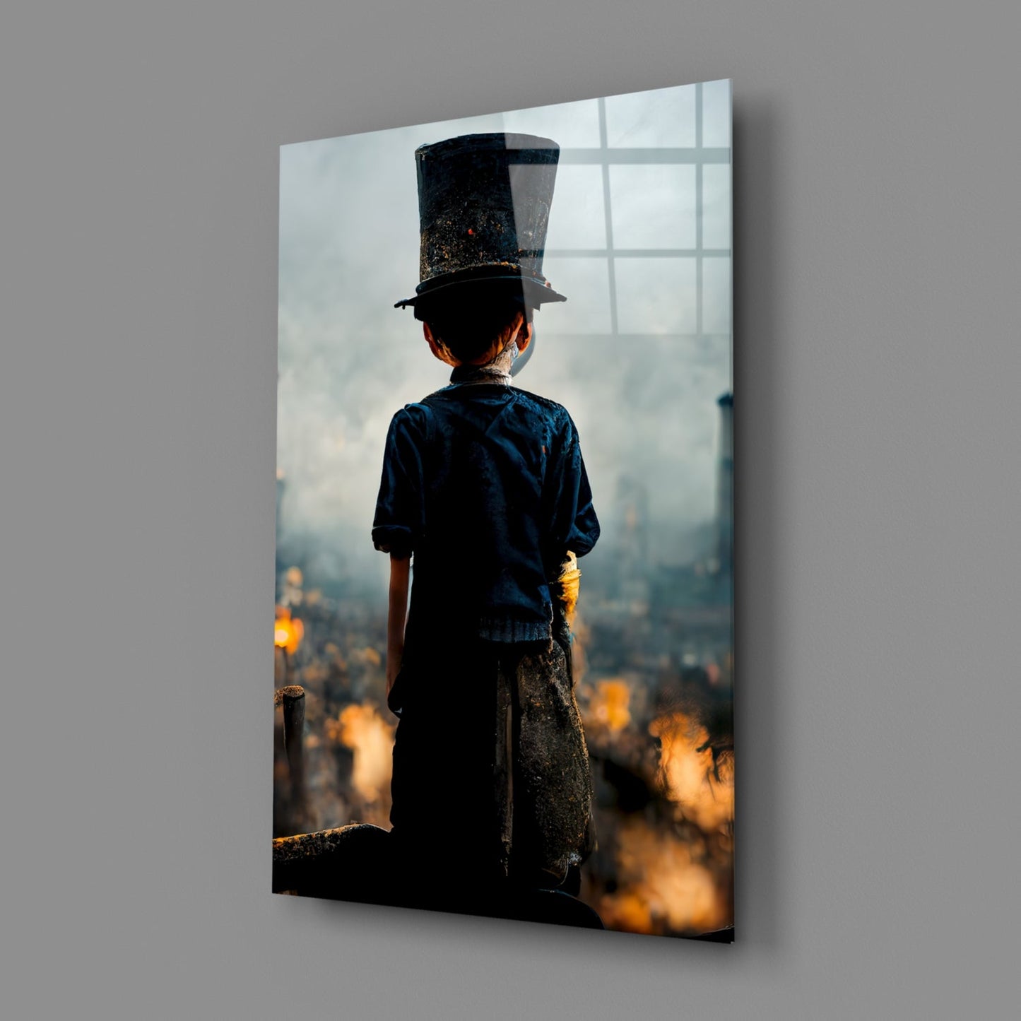 Child in top hat and blue shirt standing on edge overlooking cityscape with golden fires below, printed on glass panel.