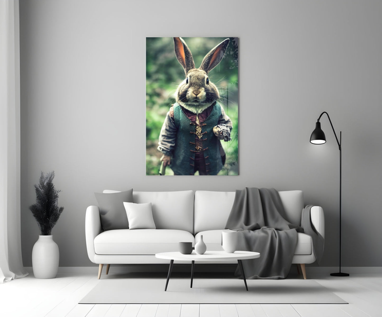 Glass wall art depicting an anthropomorphic rabbit in period clothing displayed above a white sofa in a modern living room.