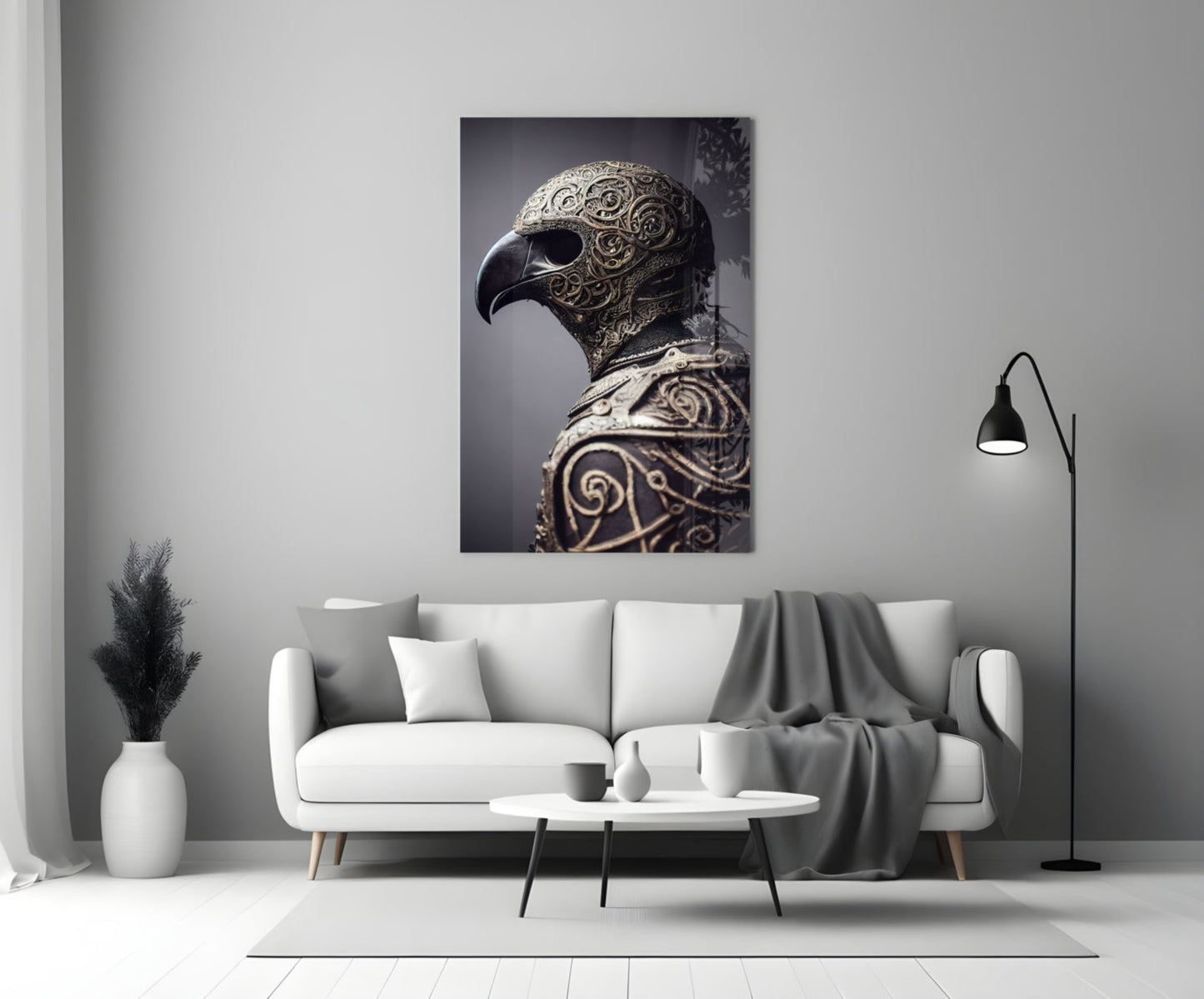 Ornate metallic eagle head sculpture with intricate scrollwork displayed on white wall above gray sofa in modern interior.