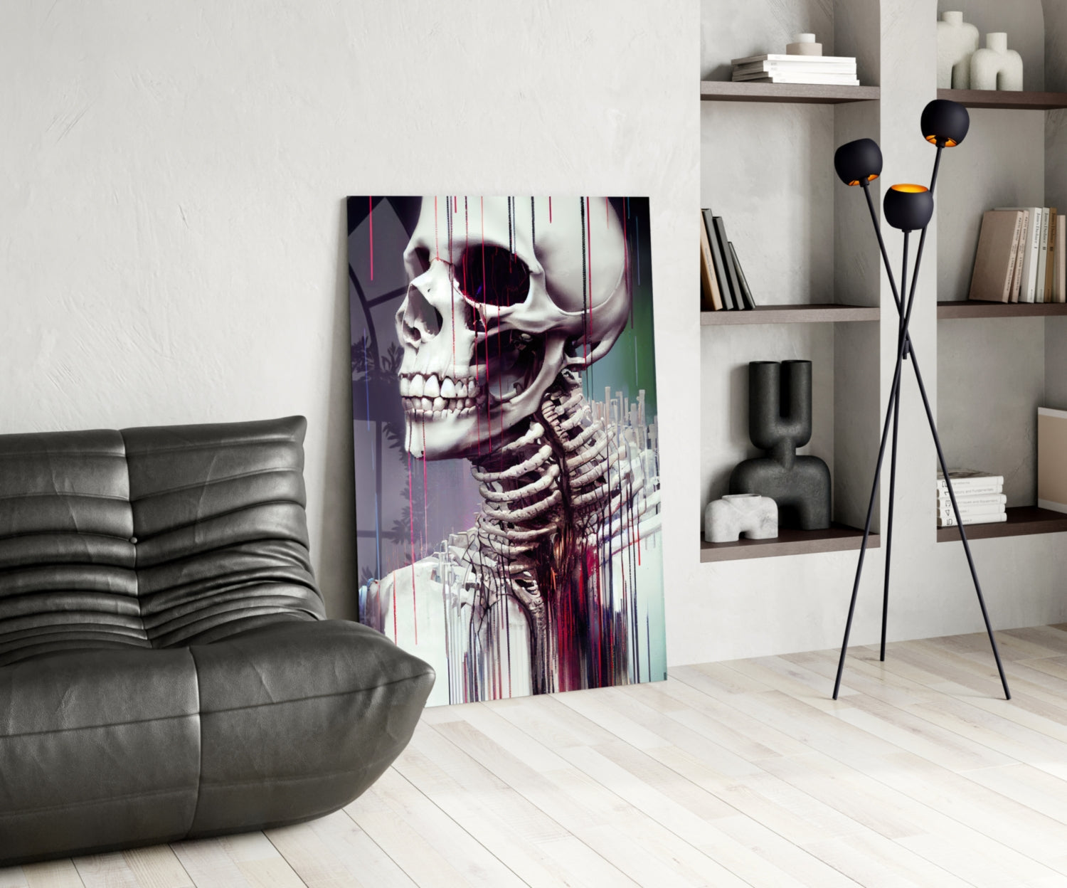 Modern living room featuring anatomical skeleton glass art with purple and teal glitch effect displayed leaning against wall beside grey leather sofa.