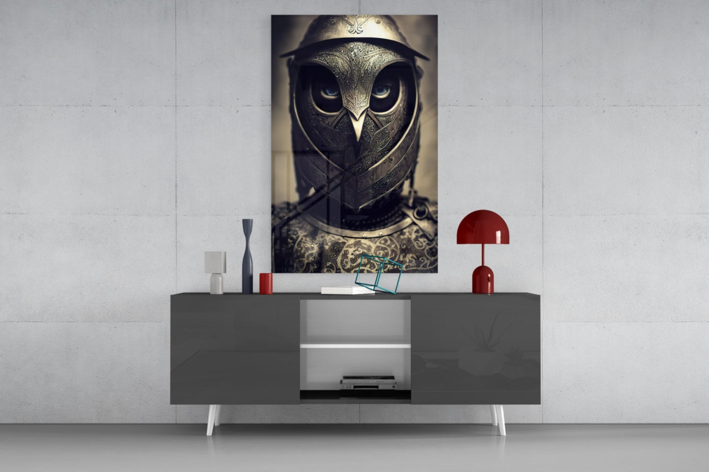 Vertical rectangular glass wall art depicting an owl warrior in metallic armor and helmet, displayed above a gray console table with red accents.