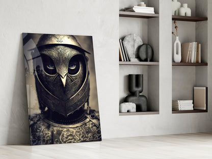 Ornate golden owl helmet artwork leaning against white wall beside minimalist shelving with books and decorative objects.