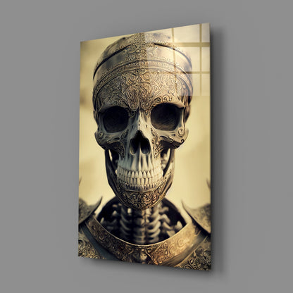 Ornate gold and silver skull with elaborate filigree detailing on cream background, mounted as glass wall art.