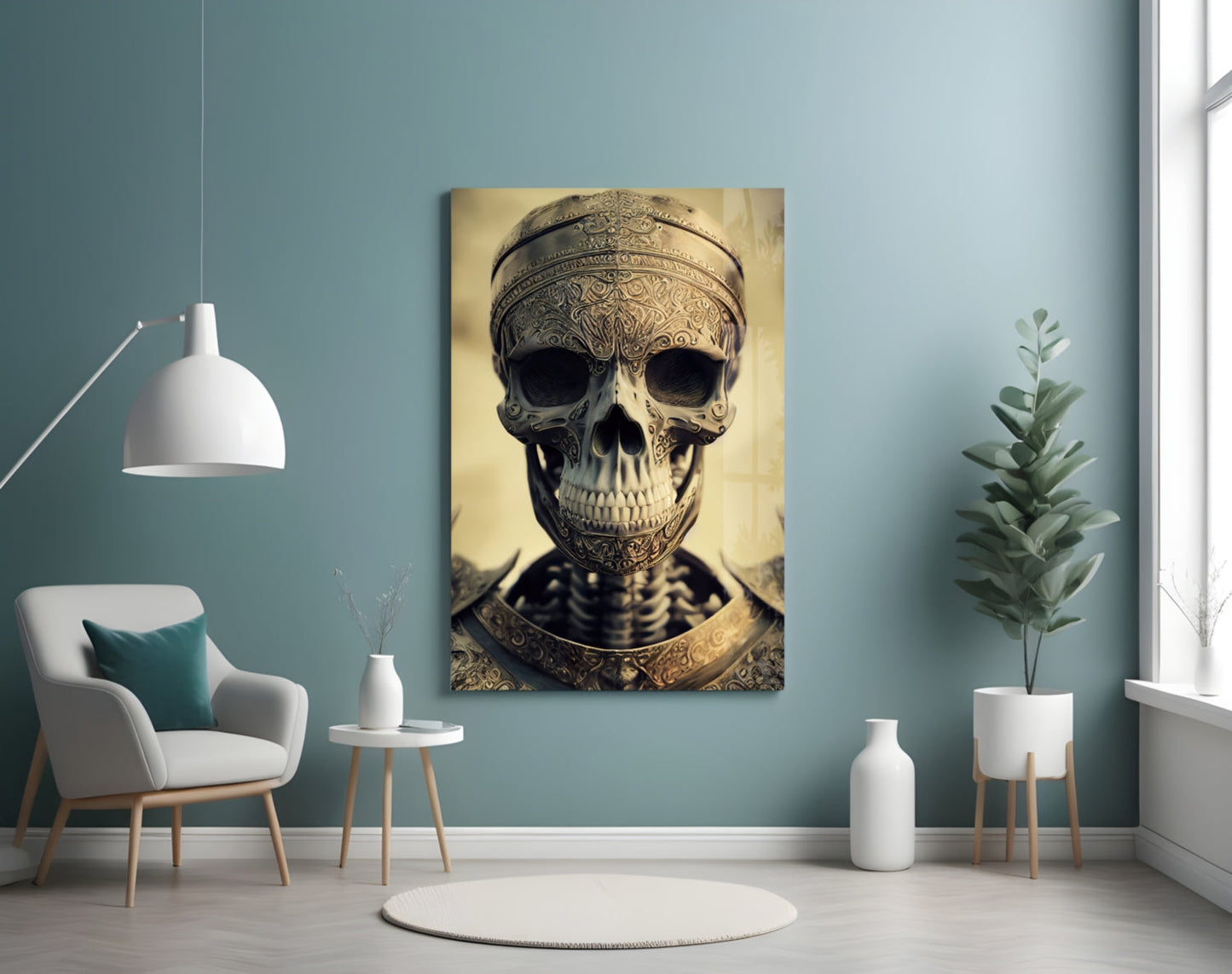 Ornate golden skull artwork displayed on turquoise wall above white chair and potted plant in modern interior setting.