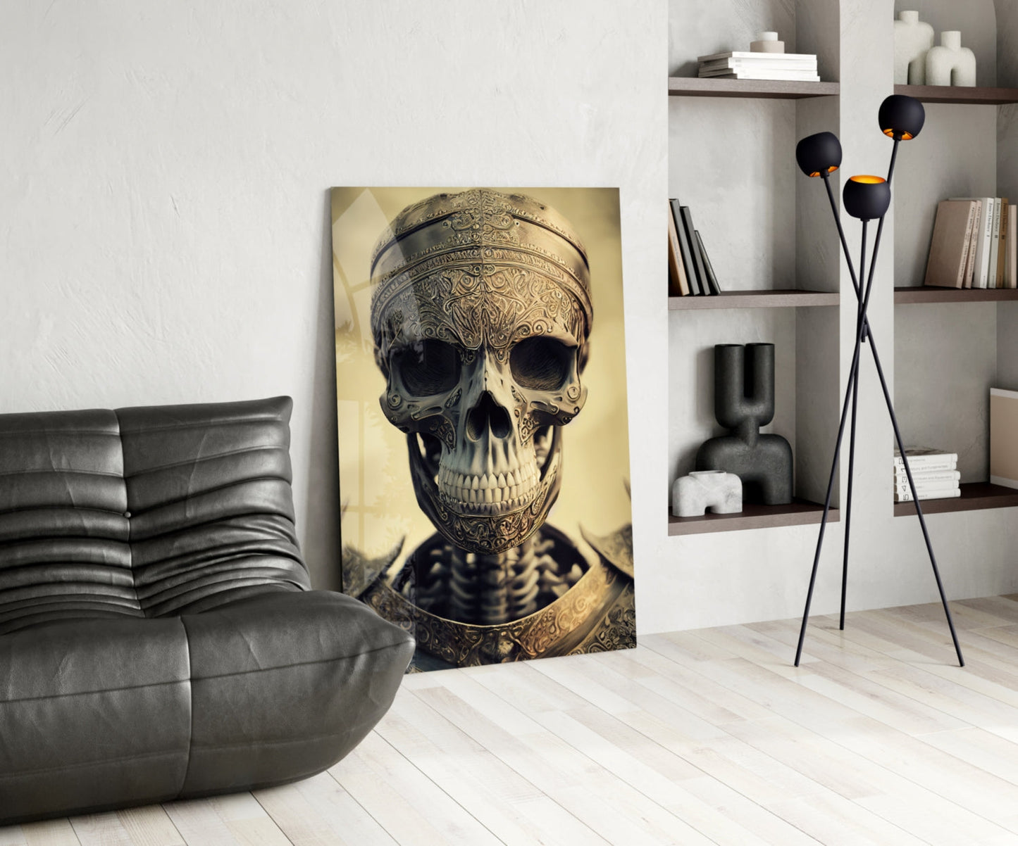 Ornate skull artwork in sepia tones displayed in modern living room with leather chair and wall shelving.