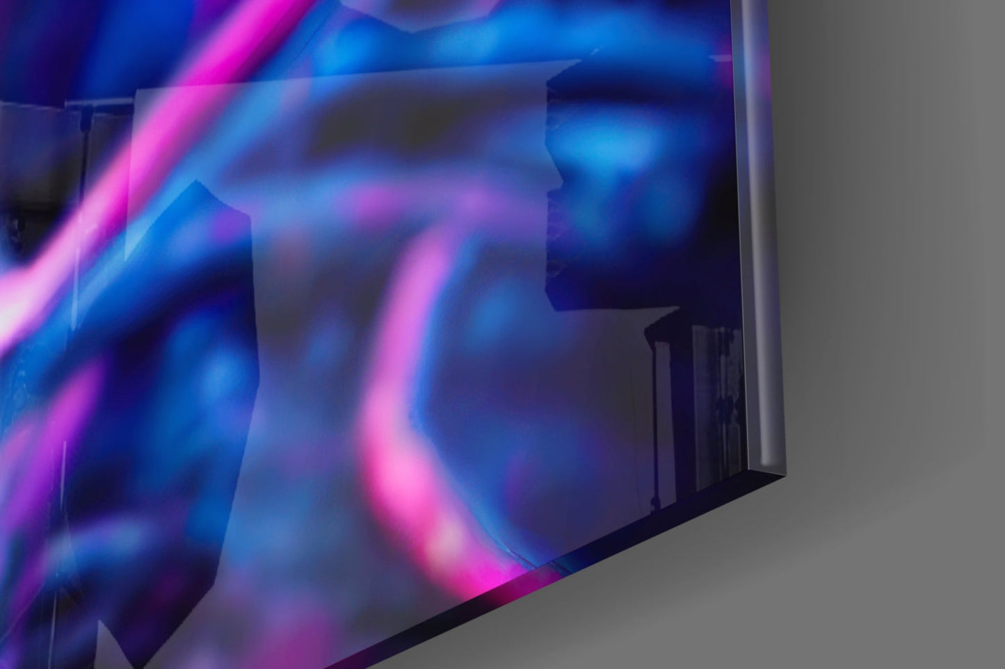 Vibrant neon blue and magenta swirling patterns on translucent glass panel mounted on white wall, angled perspective view.