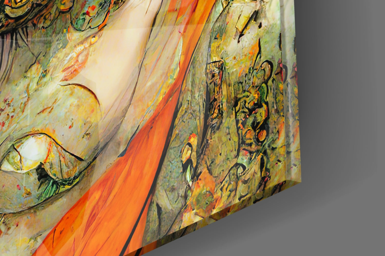 Close-up angled view of glass wall art showing layered panels with painted eyes, orange stripes, and muted gold-green tones against gray background.