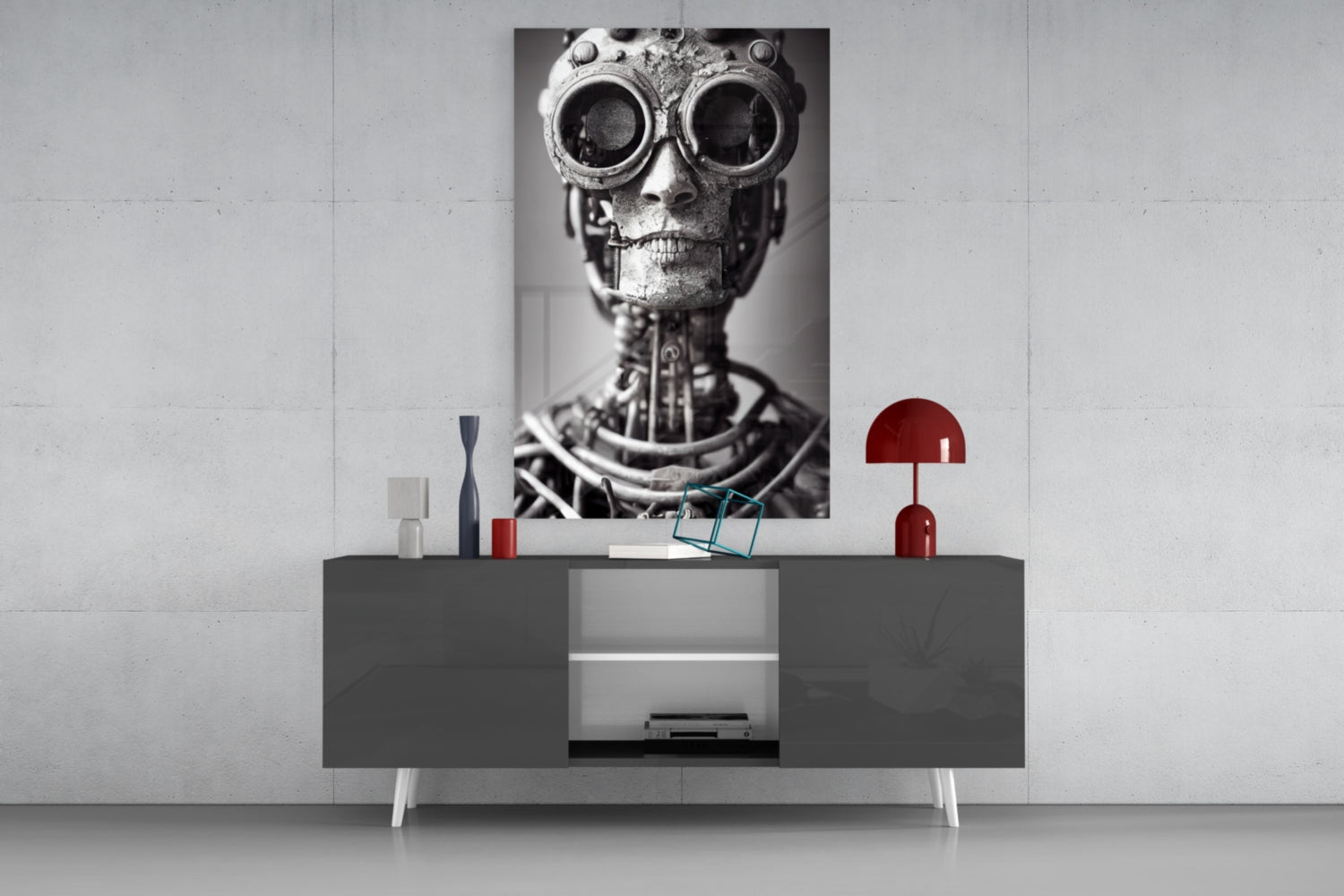 Steampunk skull artwork with mechanical goggles displayed above gray console table styled with red lamp and decorative objects.