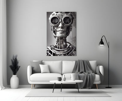 Steampunk skull with large circular goggles and mechanical details displayed as black and white canvas art above a modern living room sofa.