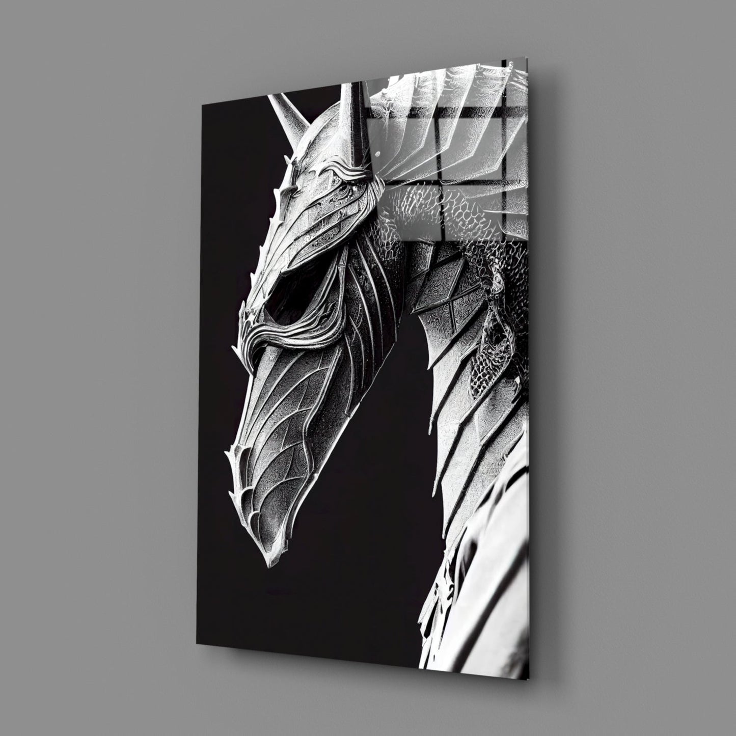 Black and white detailed etching of a dragon head in profile on glass panel, displayed at angle against gray background.