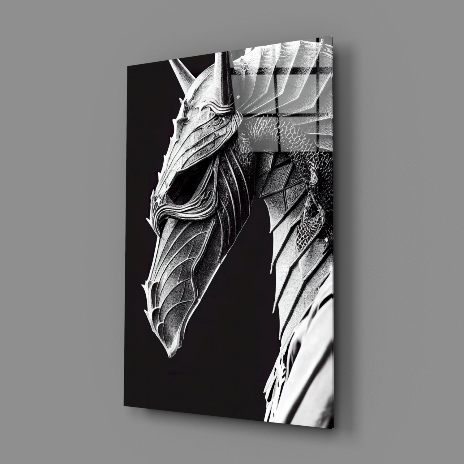 Black and white detailed etching of a dragon head in profile on glass panel, displayed at angle against gray background.