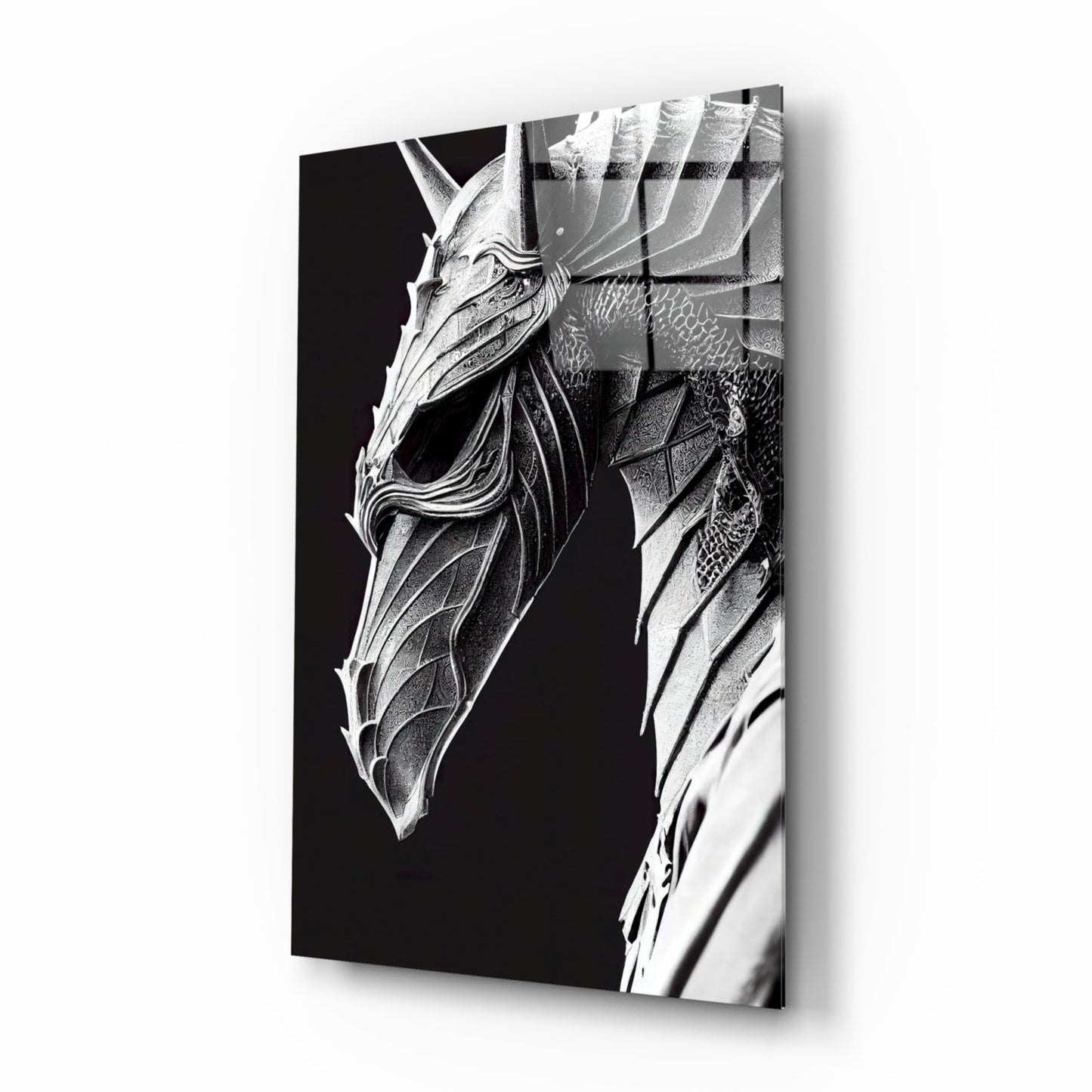 Black and white detailed glass art depicting a dragon head in profile against dark background, mounted on wall.