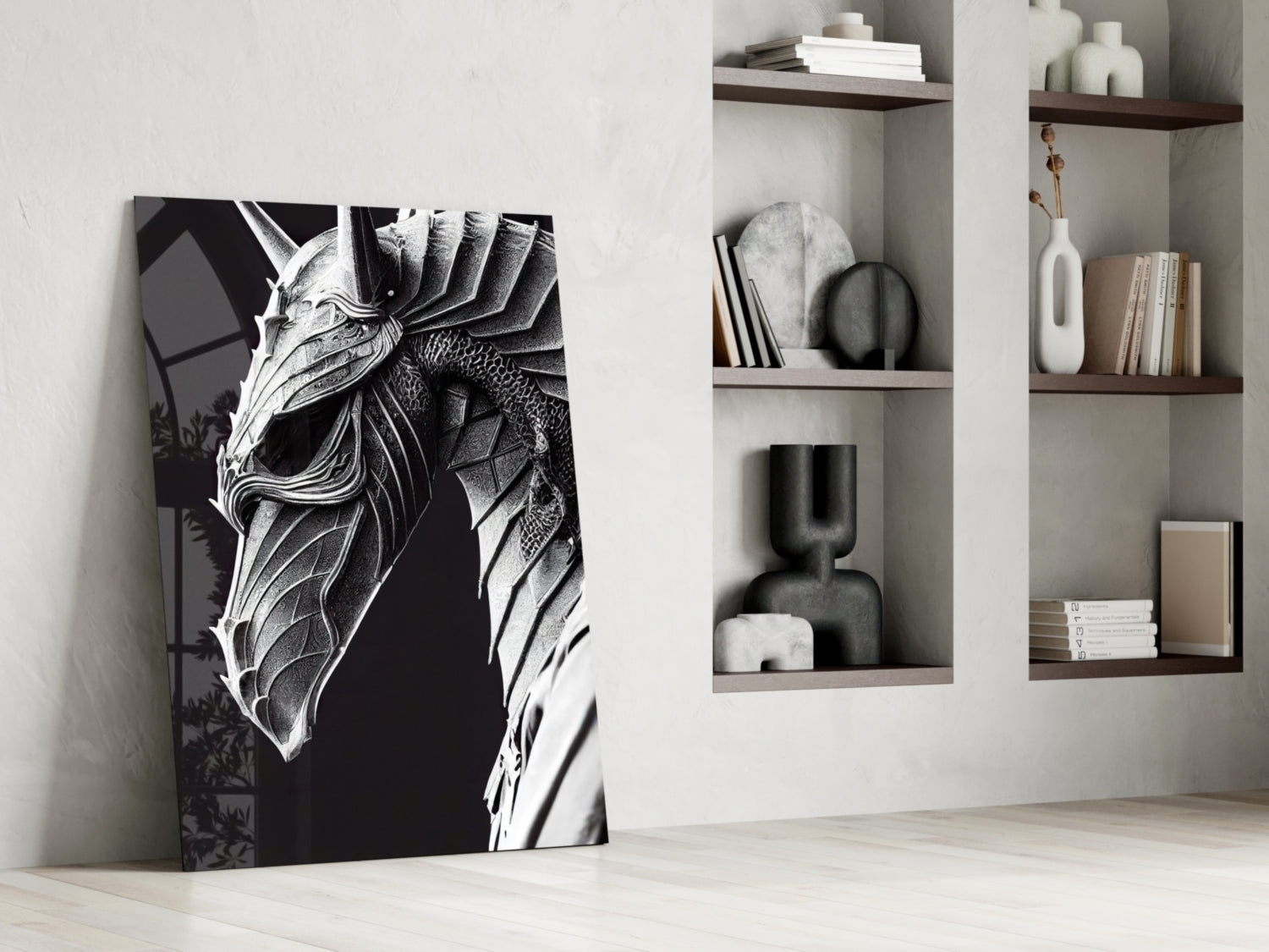 Black and white dragon head canvas art leaning against white wall beside built-in shelving unit with decorative objects.