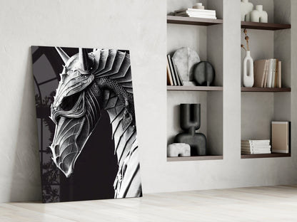 Black and white dragon head canvas art leaning against white wall beside built-in shelving unit with decorative objects.