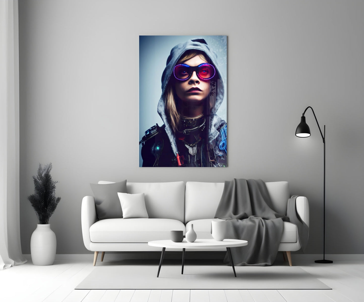 Futuristic portrait artwork featuring a person wearing pink-tinted sunglasses and gray hood displayed above white sofa in modern living room.