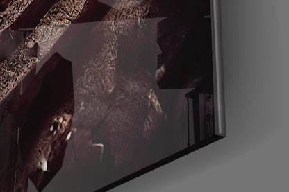 Close-up angled view of Beast Glass Wall Art showing textured dark red and beige abstract surface with dimensional glass edge detail against white wall.