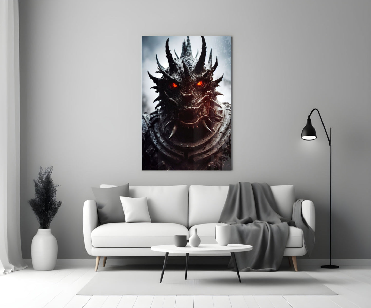 Dark dragon head with glowing red eyes displayed as glass wall art above a white sofa in a modern living room.