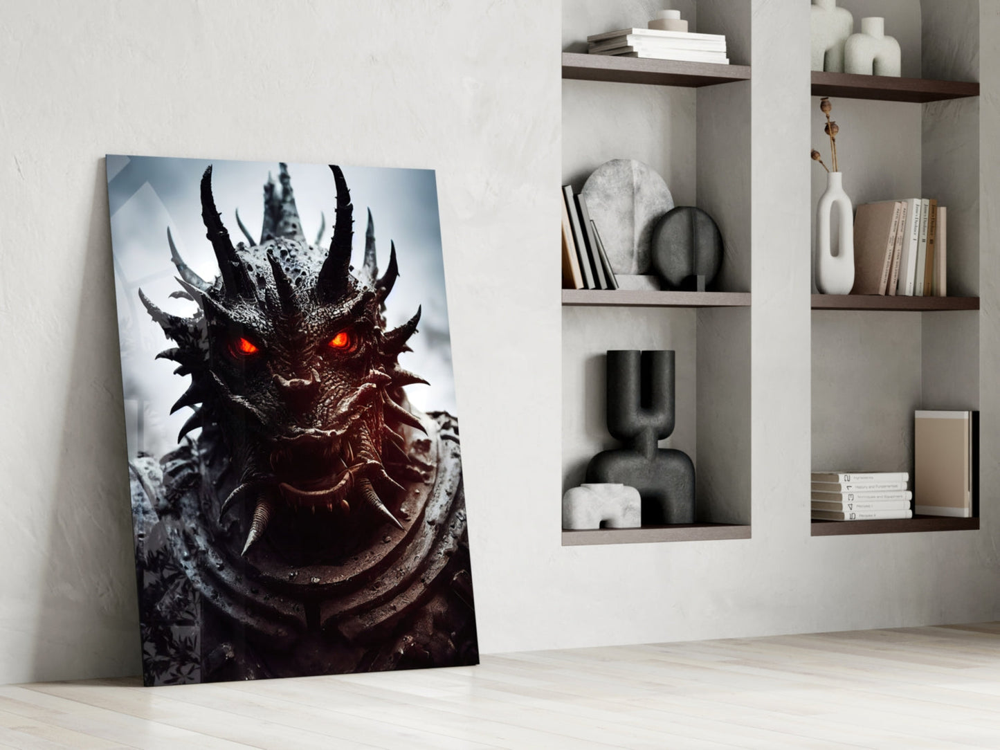 Dark dragon portrait with glowing red eyes leaning against white wall beside wooden floating shelves with decorative objects.